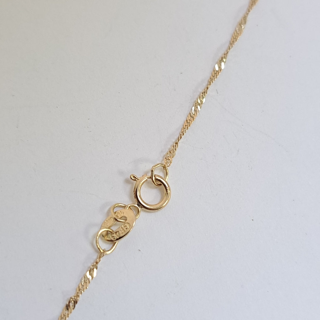 CADENA, DIJE ORO 10 K 2 GRMS (SEMINUEVO)
