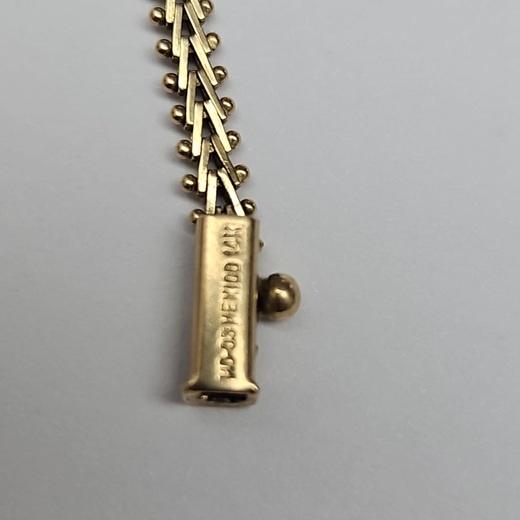 PULSERA ORO COMBINADO 14 K 7.1 GRMS (SEMINUEVO)