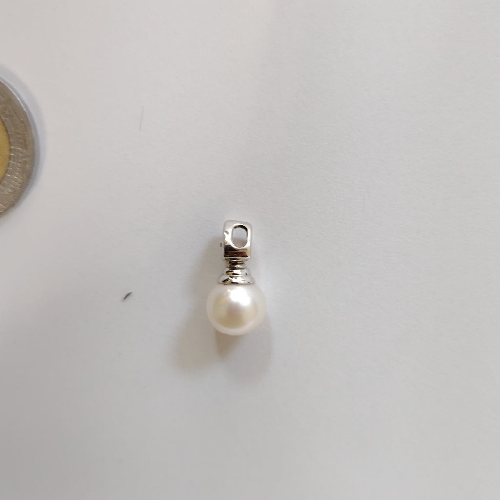 DIJE ORO BLANCO 18 K 1,40 GRMS (SEMINUEVO)