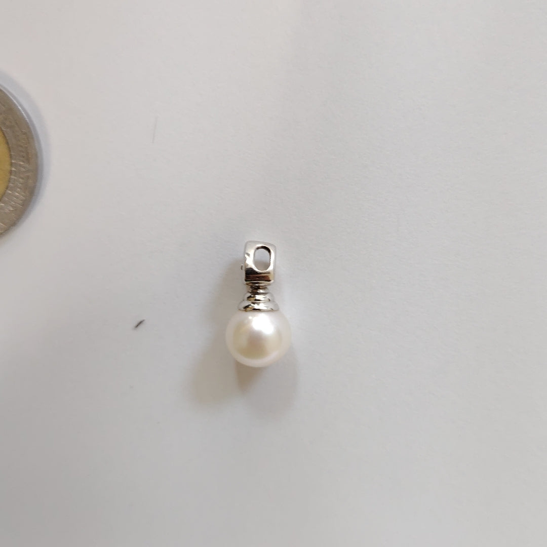 DIJE ORO BLANCO 18 K 1,40 GRMS (SEMINUEVO)
