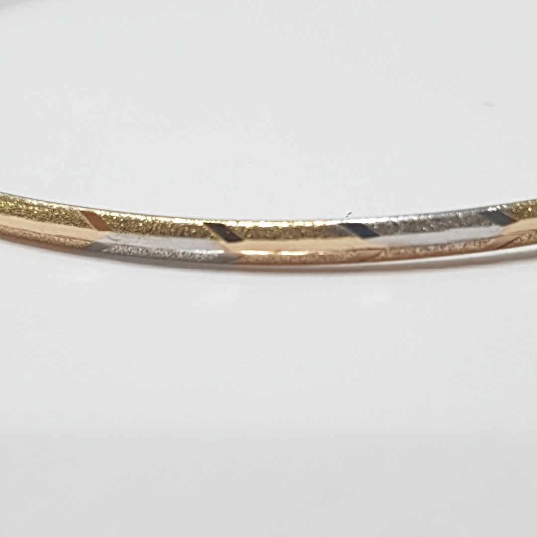 PULSERA RIGIDA ORO COMBINADO 10 K 3,30 GRMS (SEMINUEVO)