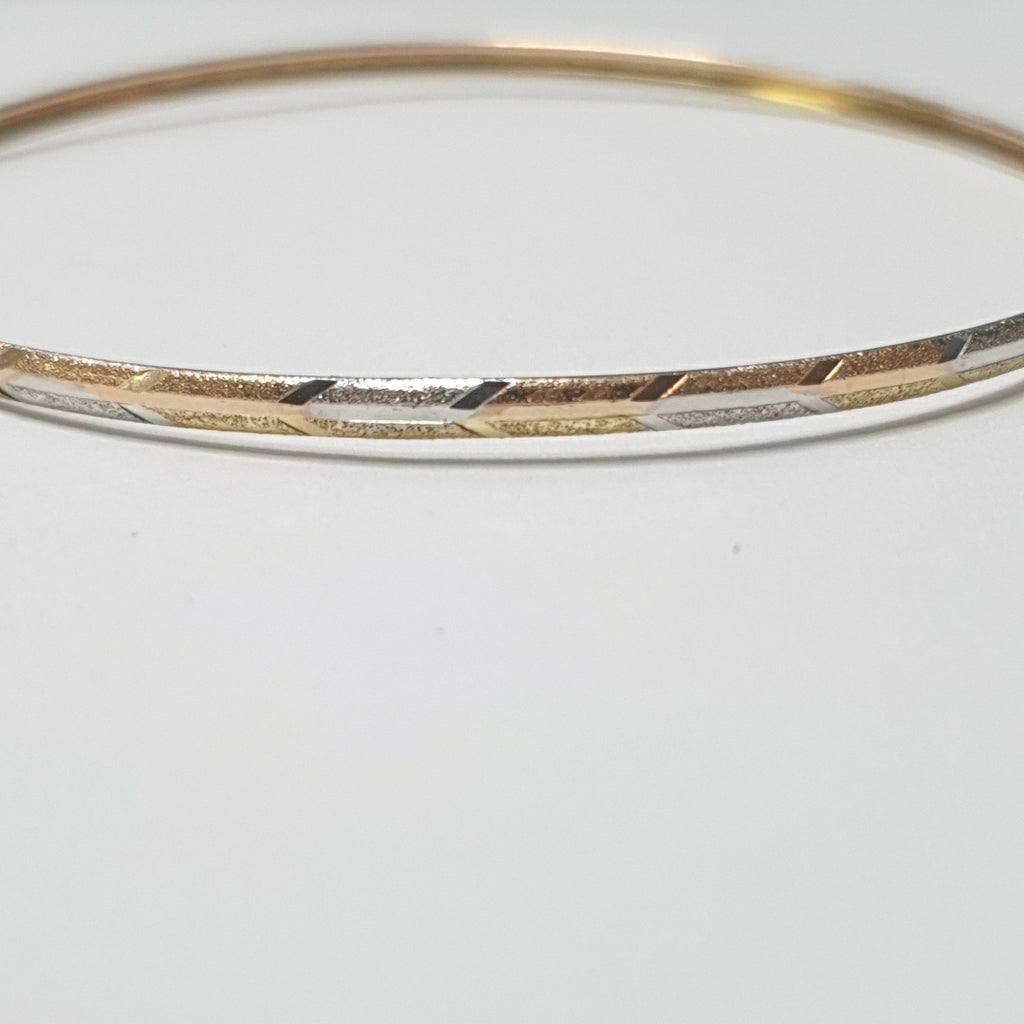 PULSERA RIGIDA ORO COMBINADO 10 K 3,20 GRMS (SEMINUEVO)