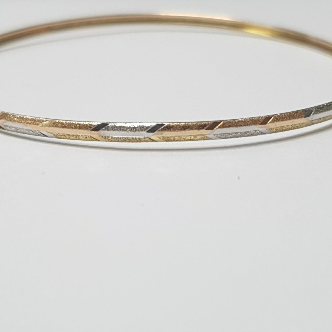 PULSERA RIGIDA ORO COMBINADO 10 K 3,20 GRMS (SEMINUEVO)