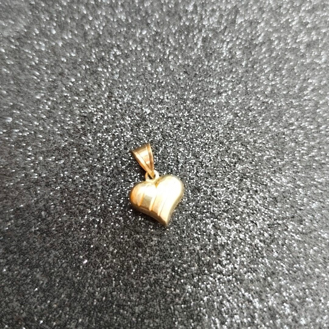 DIJE ORO 10 K 0.6 GRMS (SEMINUEVO)