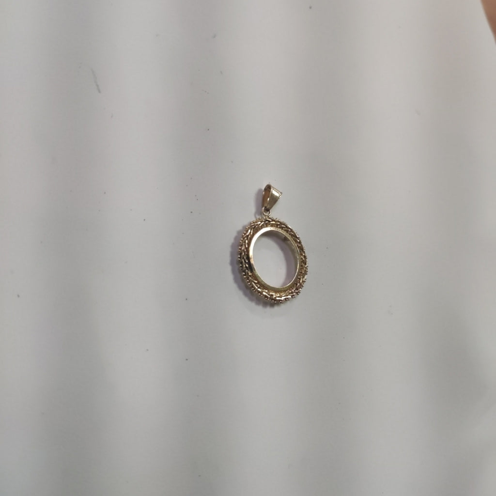 K1 1.9 GRMS 14 K IDENTIFICACIÓN DIJE MATERIALES ORO CANTIDAD DE PIEZA (SEMINUEVO)