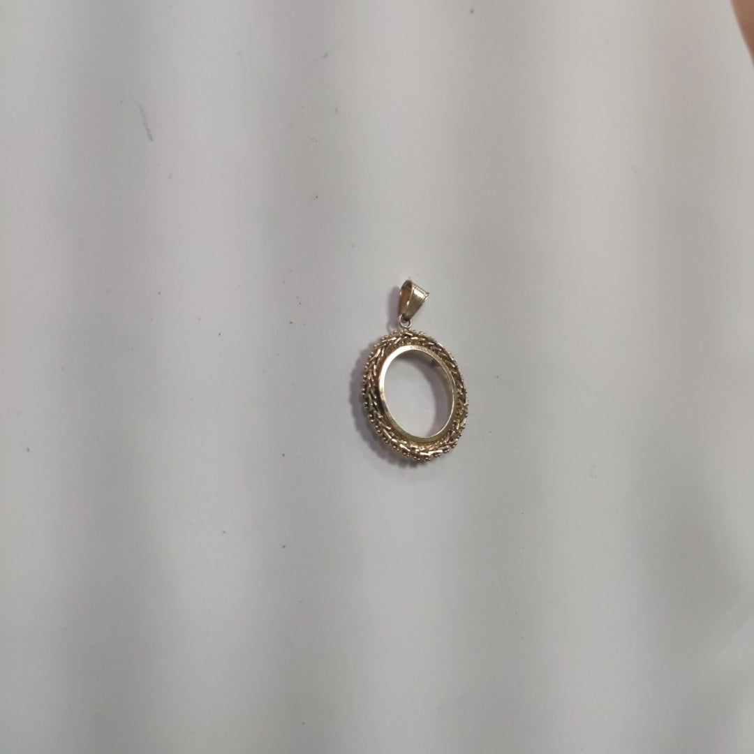 K1 1.9 GRMS 14 K IDENTIFICACIÓN DIJE MATERIALES ORO CANTIDAD DE PIEZA (SEMINUEVO)