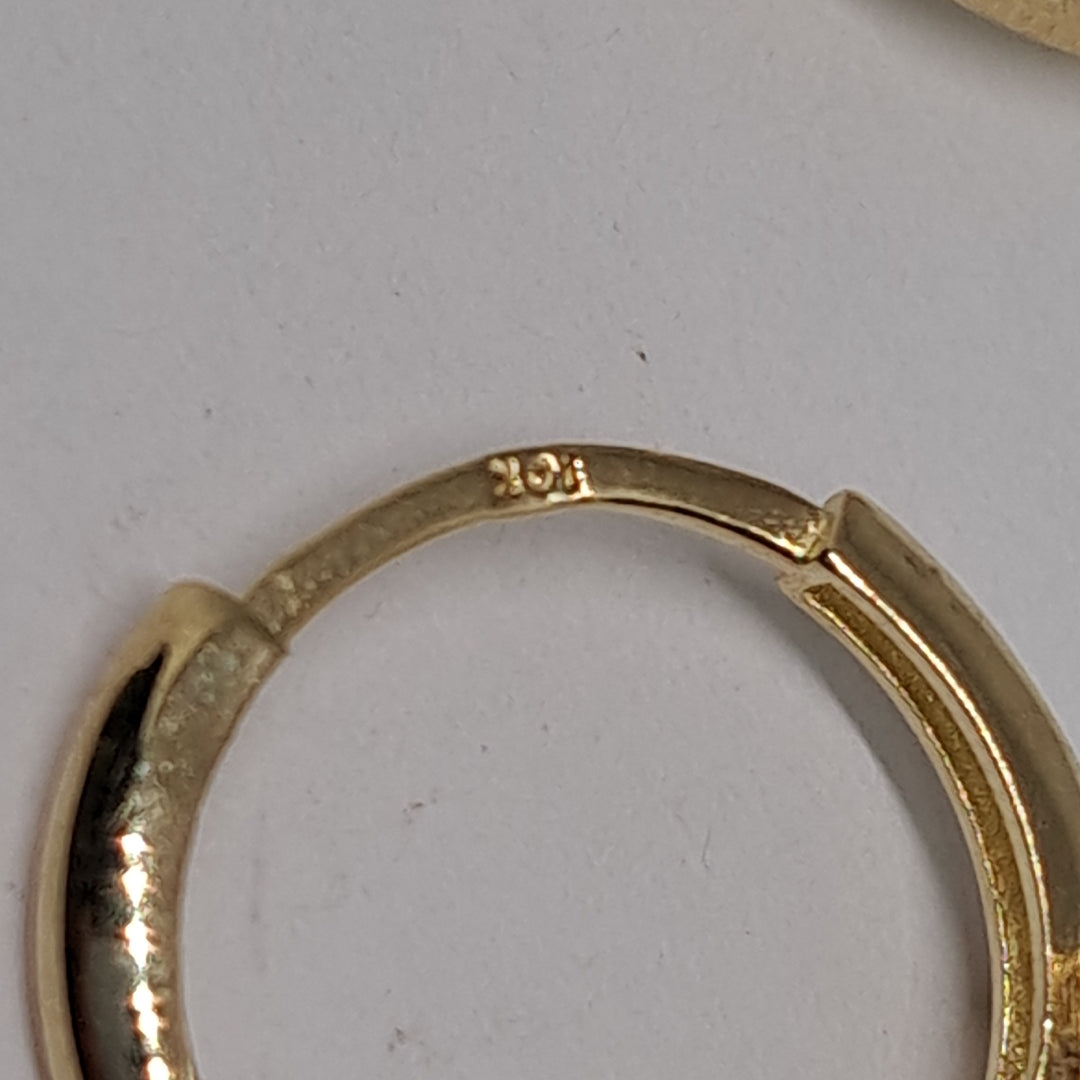 ARETES ARRACADAS FIG ESTRELLA CIRCONIAS 10K 1.7 GR (NUEVO)