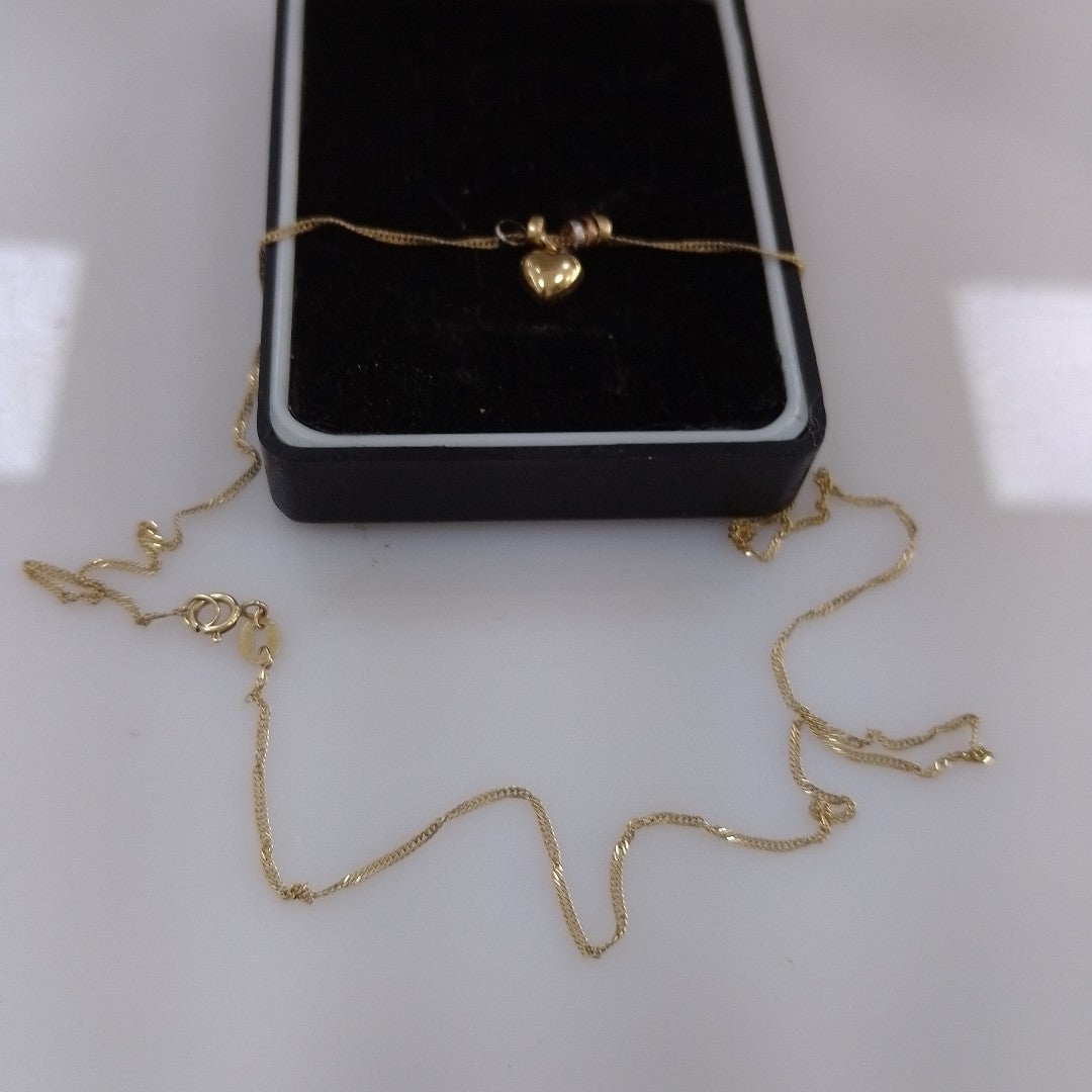 CADENA, DIJE ORO 10 K 1.5 GRMS (SEMINUEVO)