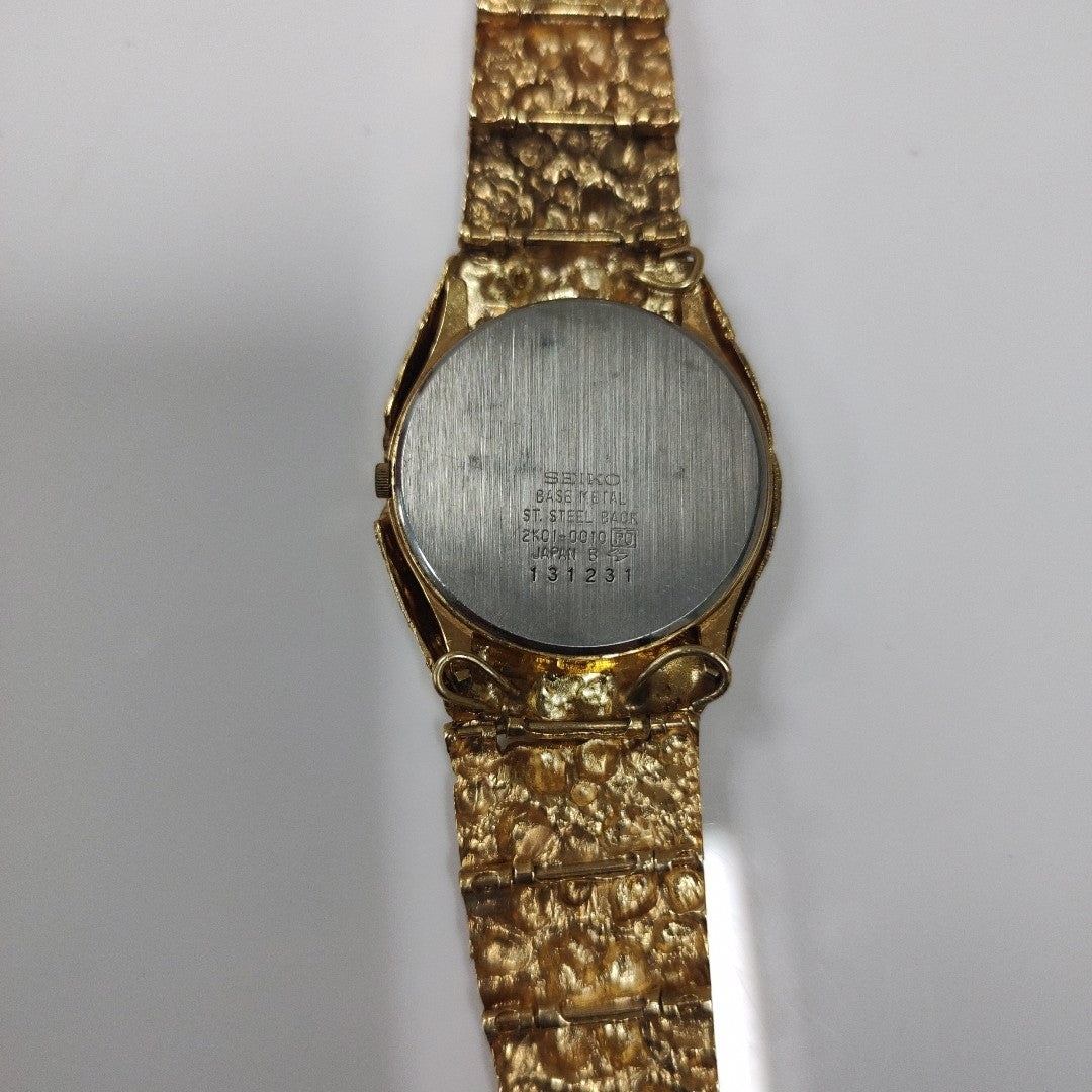 RELOJ CAJA ACERO PULSO ORO. ORO. 14 K 54.5 GRMS (SEMINUEVO)