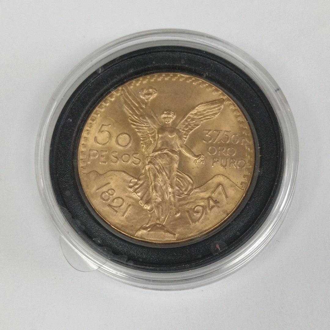 K1 41.6 GRMS - DESC.  0 GRAMOS - 21 K - AVALÚO  77126.4 * * IDENTIFICACIÓN  MONEDA NOMINATIVA. * MONEDAS PESOS  50 PESO (SEMINUEVO)