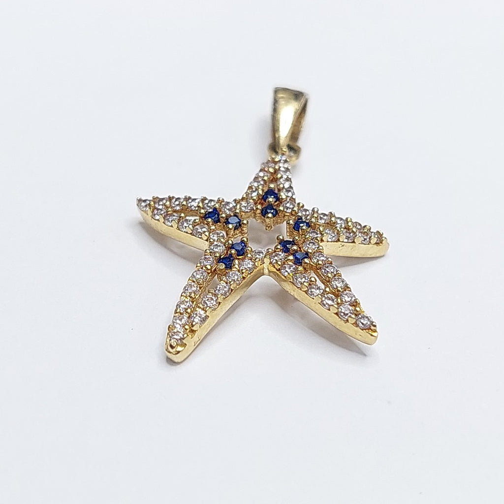 10297DIJ00000B363 FRD5 DIJE ESTRELLA DE MAR CON CIRCONIAS BLANCAS Y AZULES ORO 14K 1.5GRS (NUEVO)