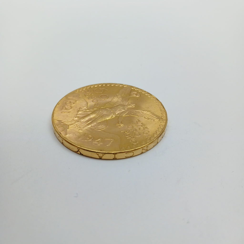 K1 41.6 GRMS - DESC. 0 GRAMOS - 21 K - AVALÚO 74131.2 * * IDENTIFICACIÓN MONEDA NOMINATIVA. * MONEDAS PESOS 50 PESO (SEMINUEVO)