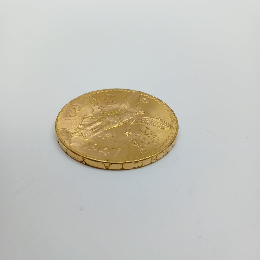 K1 41.6 GRMS - DESC. 0 GRAMOS - 21 K - AVALÚO 74131.2 * * IDENTIFICACIÓN MONEDA NOMINATIVA. * MONEDAS PESOS 50 PESO (SEMINUEVO)