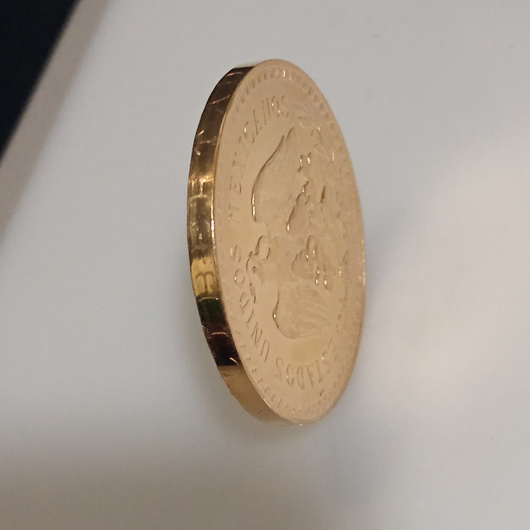K1 41.6 GRMS - DESC. 0 GRAMOS - 21 K - AVALÚO 77126.4 * * IDENTIFICACIÓN MONEDA NOMINATIVA. * MONEDAS PESOS 50 PESO (SEMINUEVO)
