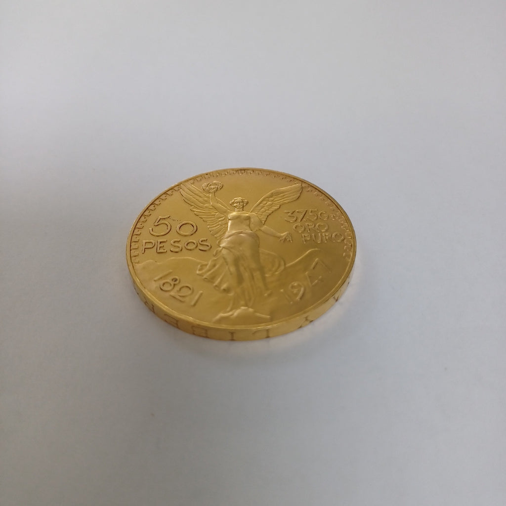 K1 41.6 GRMS - DESC. 0 GRAMOS - 21 K - AVALÚO 71884.8 * * IDENTIFICACIÓN MONEDA NOMINATIVA. * MONEDAS PESOS 50 PESO (SEMINUEVO)