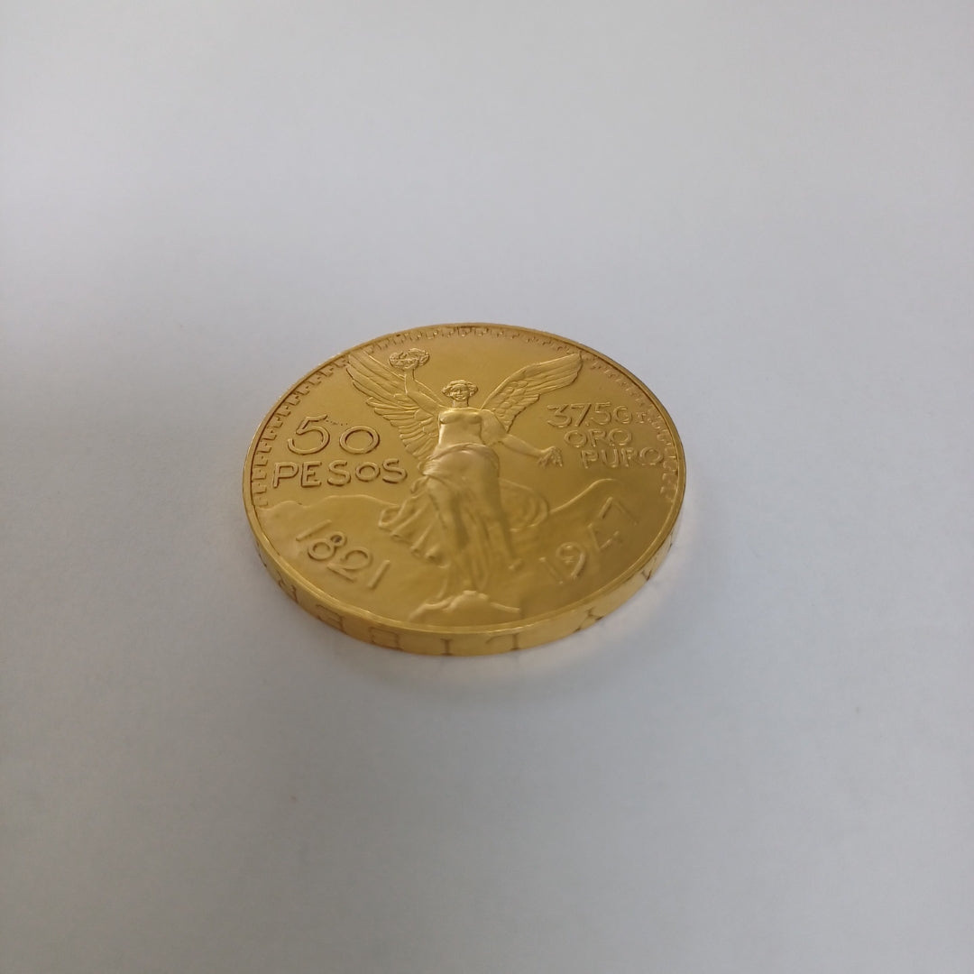 K1 41.6 GRMS - DESC. 0 GRAMOS - 21 K - AVALÚO 71884.8 * * IDENTIFICACIÓN MONEDA NOMINATIVA. * MONEDAS PESOS 50 PESO (SEMINUEVO)