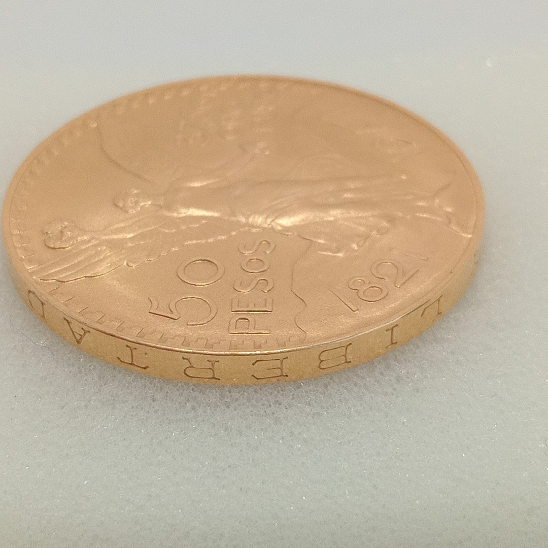 K1 41,60 GRMS - DTO. 0,00 GRMS - 21 K - AVALÚO 79534,21 * IDENTIFICACIÓN MONEDA NOMINATIVA * MONEDAS PESOS 50 PESOS (SEMINUEVO)