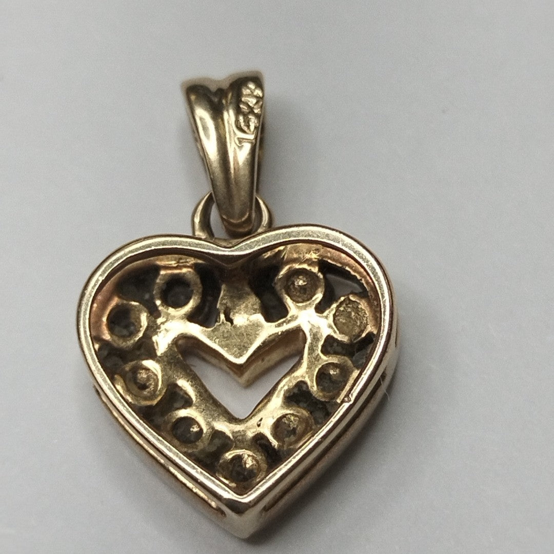 DIJE. ORO. 14 K 2 GRMS (SEMINUEVO)