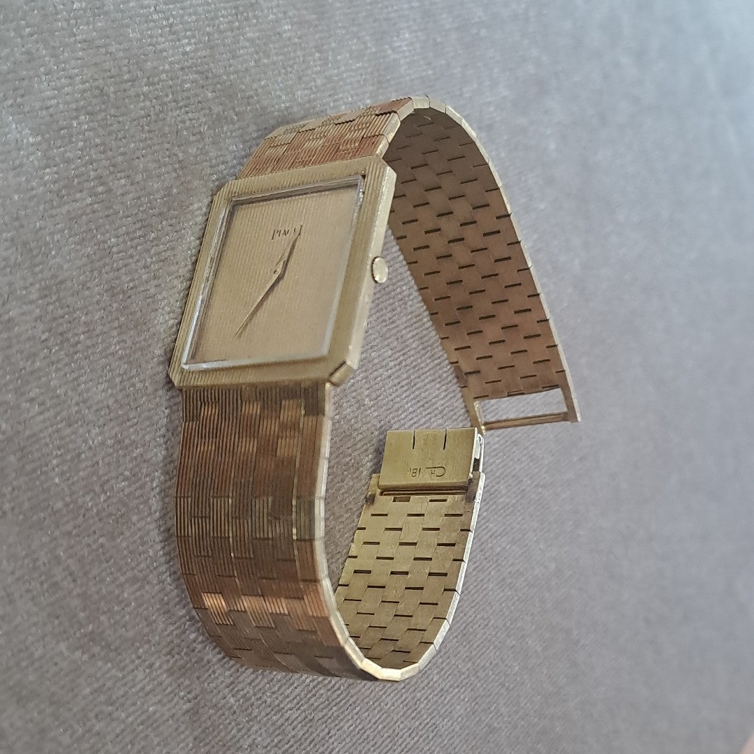 RELOJ CAJA Y PULSO ORO. ORO. 18 K 68.6 GRMS (SEMINUEVO)