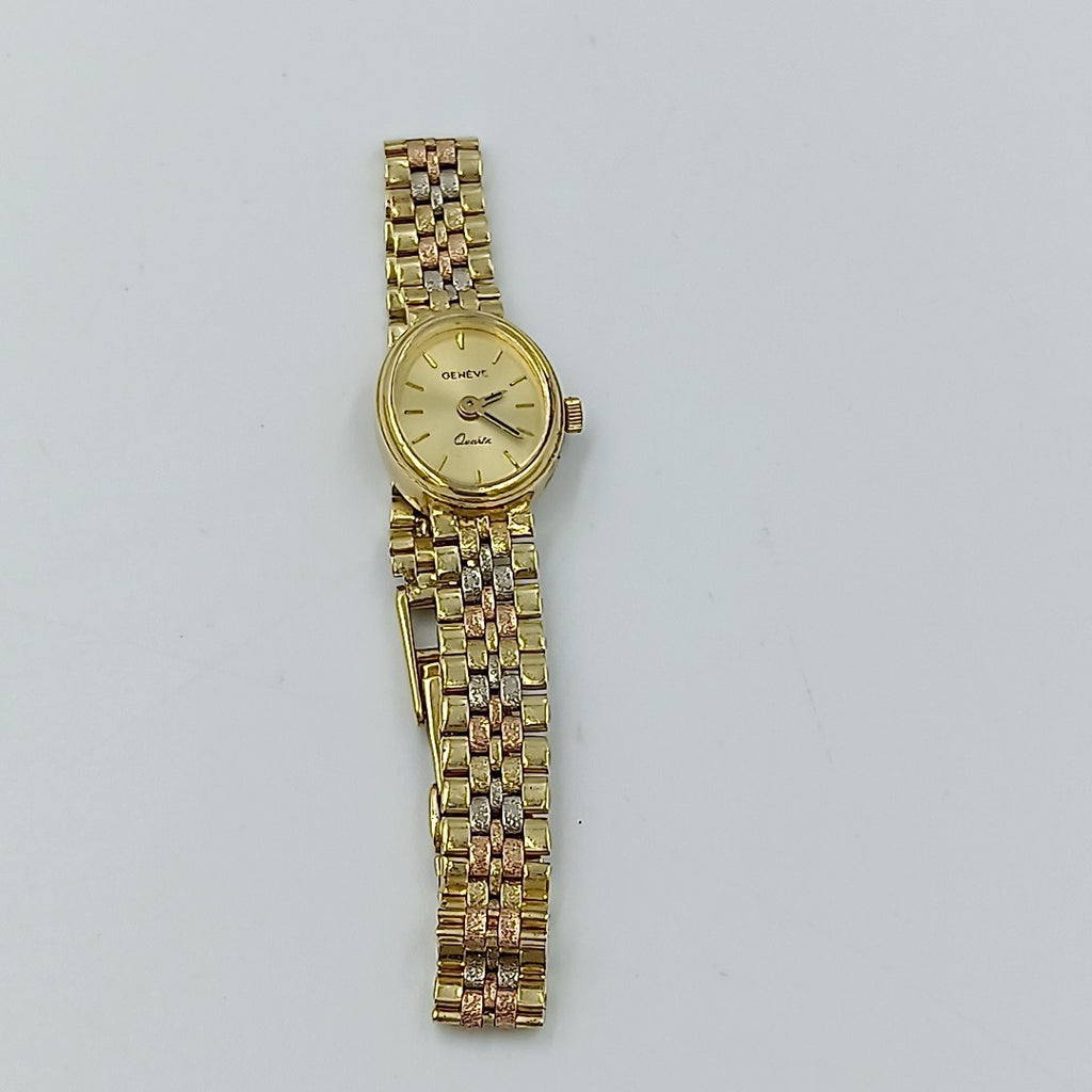 RELOJ CAJA Y PULSO ORO ORO, ORO COMBINADO 14 K 20.2 GRMS (SEMINUEVO)