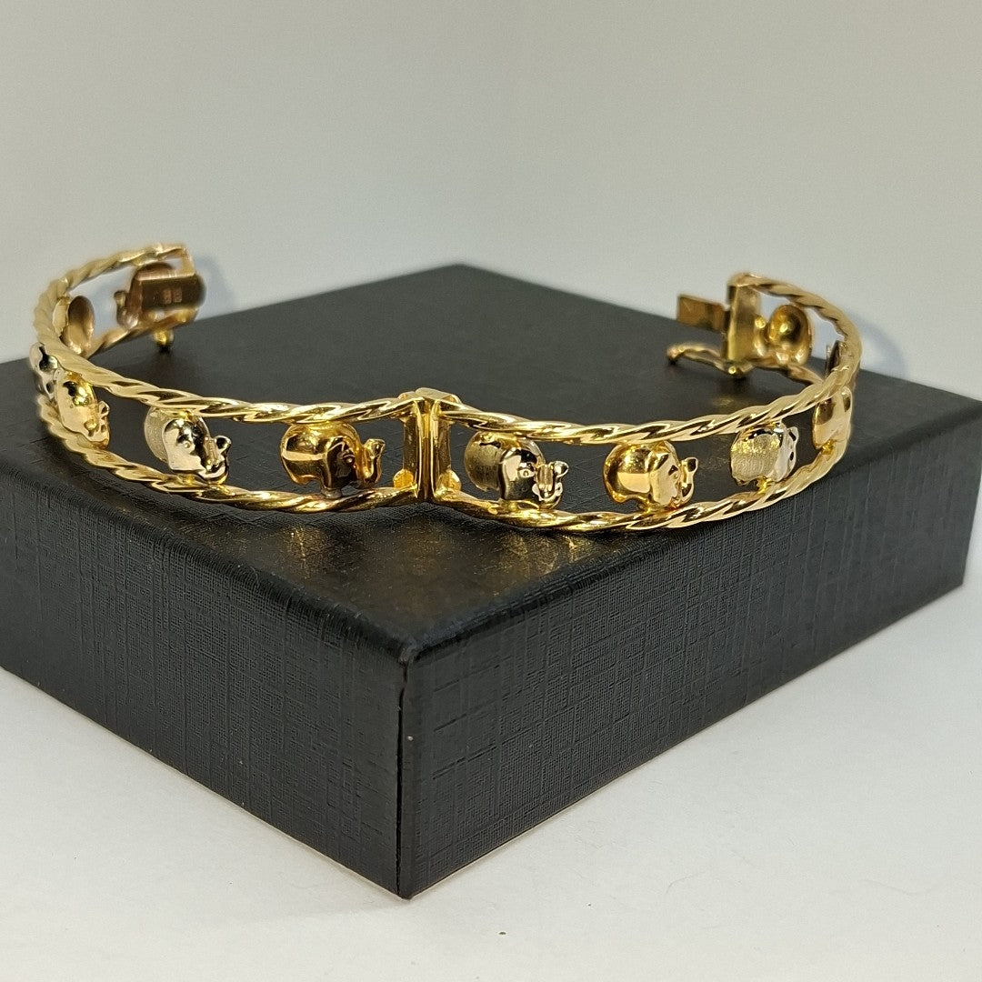 PULSERA RIGIDA ORO COMBINADO 14 K 9.6 GRMS (SEMINUEVO)