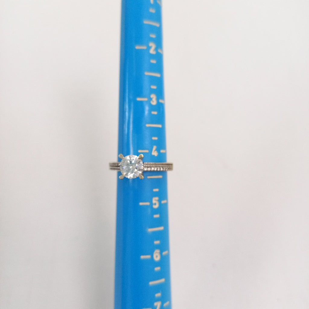 SOLITARIO ORO BLANCO 14 K 3.4 GRMS (SEMINUEVO)