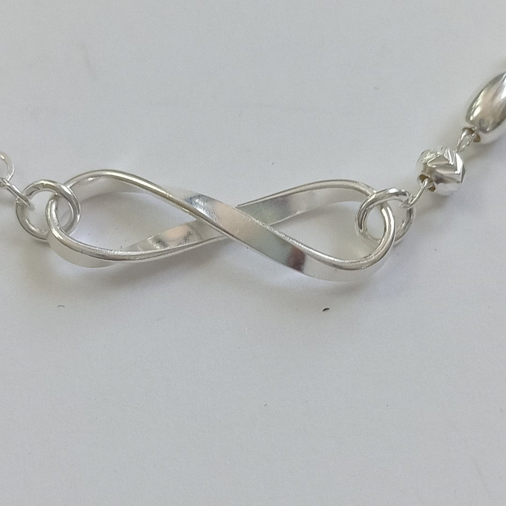 PULSERA TEJIDO INFINITO PLATA .925 18 CM 2.3 GR (NUEVO)
