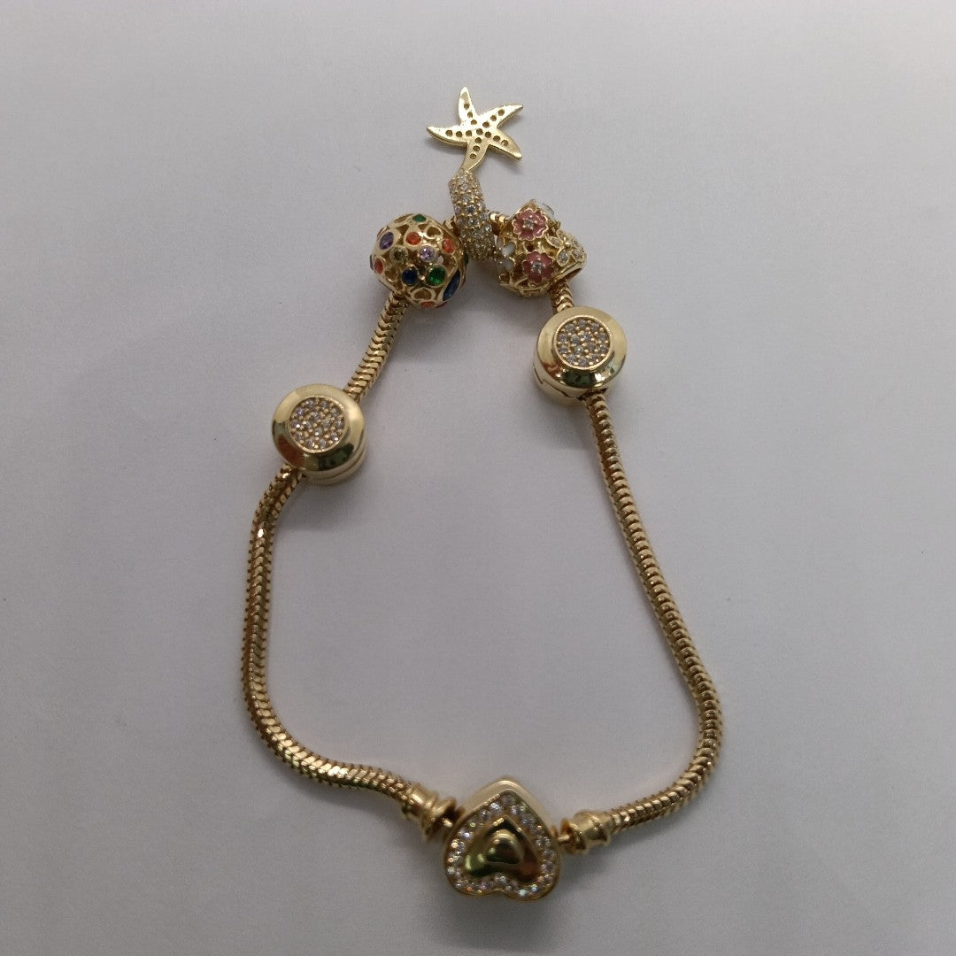 PULSERA CHARM ORO 14K 17.2 (NUEVO)