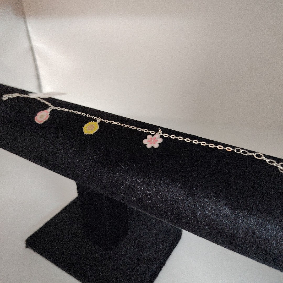 PULSERA TEJIDO ESPECIAL CON DIJE FLORES PLATA .925 21 CM 2.3 GR (NUEVO)