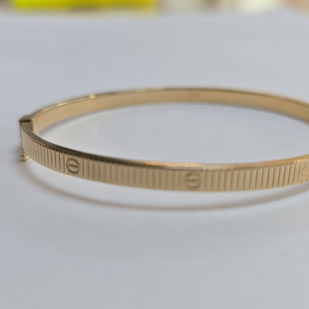 PULSERA RIGIDA ORO 10 K 6.6 GRMS (SEMINUEVO)