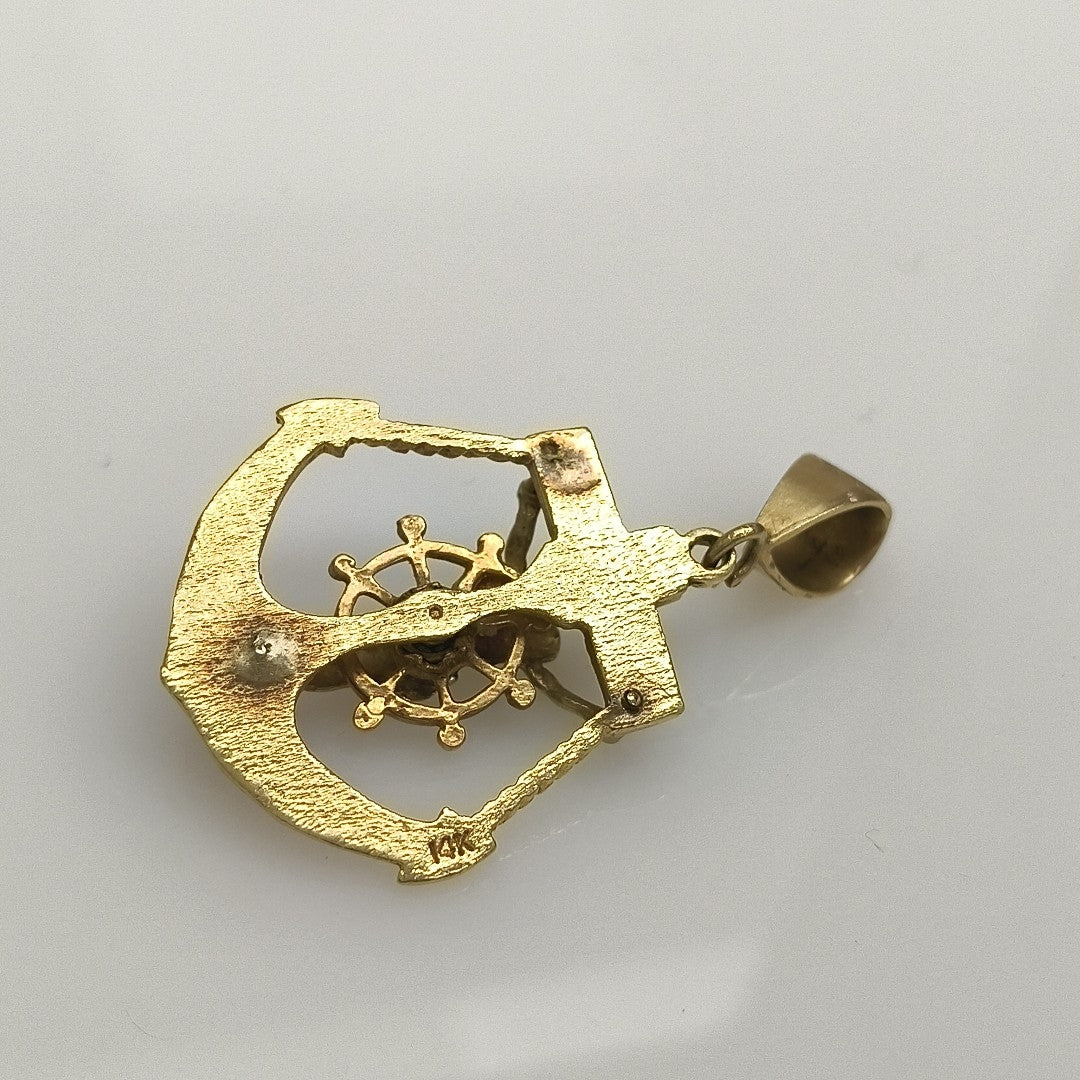 CRISTO EN ANCLA ORO 14 K 6.7 GRMS (SEMINUEVO)