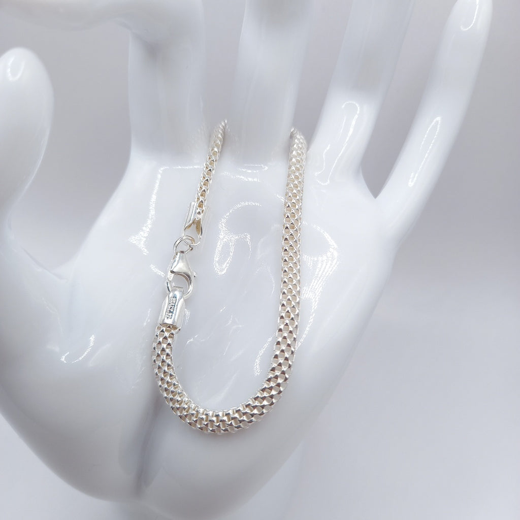 PULSERA TEJIDO ESPECIAL PLATA .925 18 CM 4.9 GR (NUEVO)