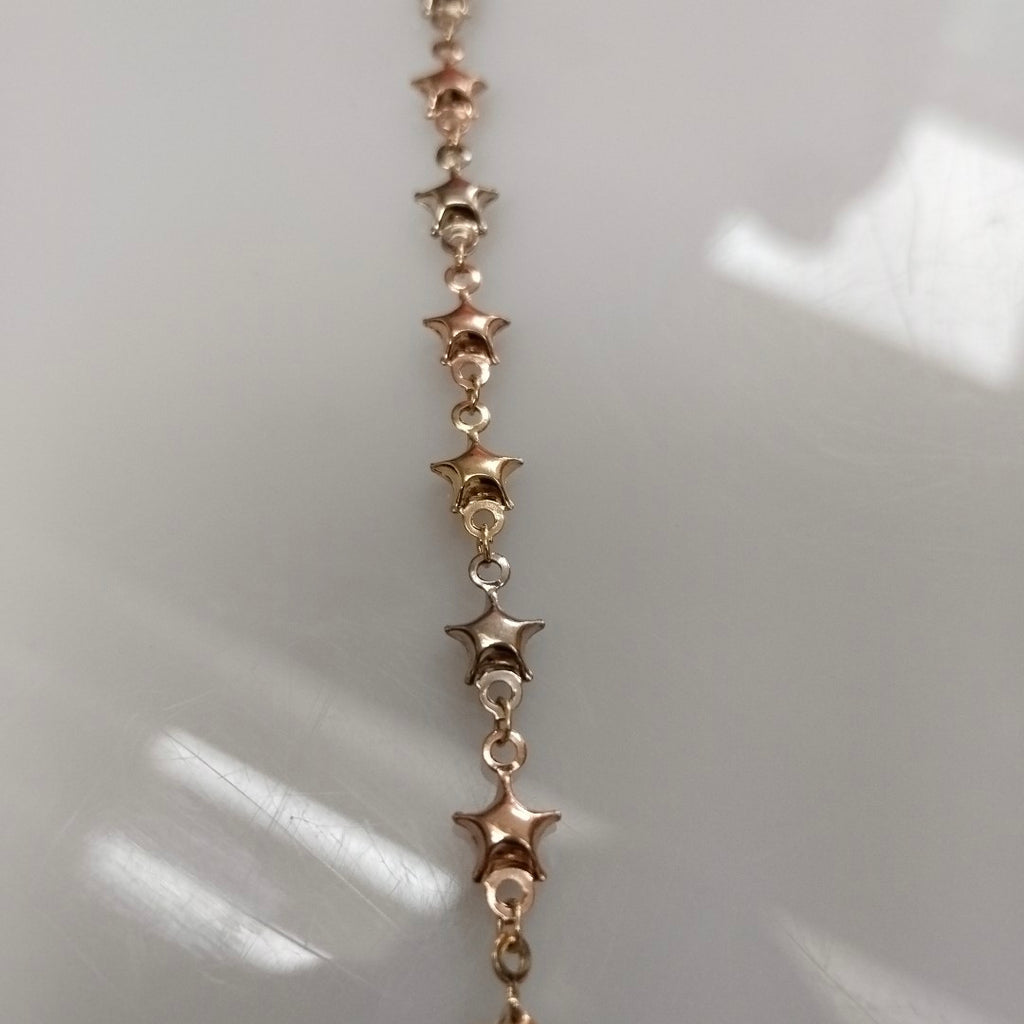 PULSERA TEJIDO ESPECIAL ESTRELLAS COMBINADAS 14K 18 CM 2.2 GR (NUEVO)