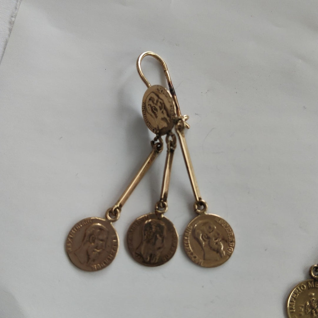 K1 5.2 GRMS 12 K IDENTIFICACIÓN ARETES PAR MATERIALES ORO CANTIDAD DE PI (SEMINUEVO)