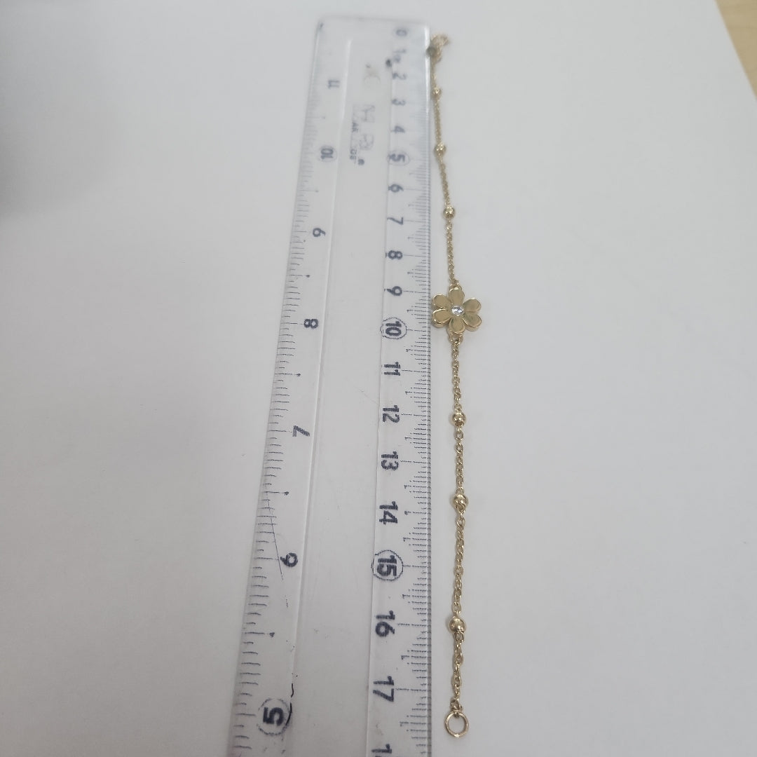 PULSERA TEJIDO ESPECIAL FLOR CON CIRCONIA 14K 18 CM 2.6 GR (NUEVO)