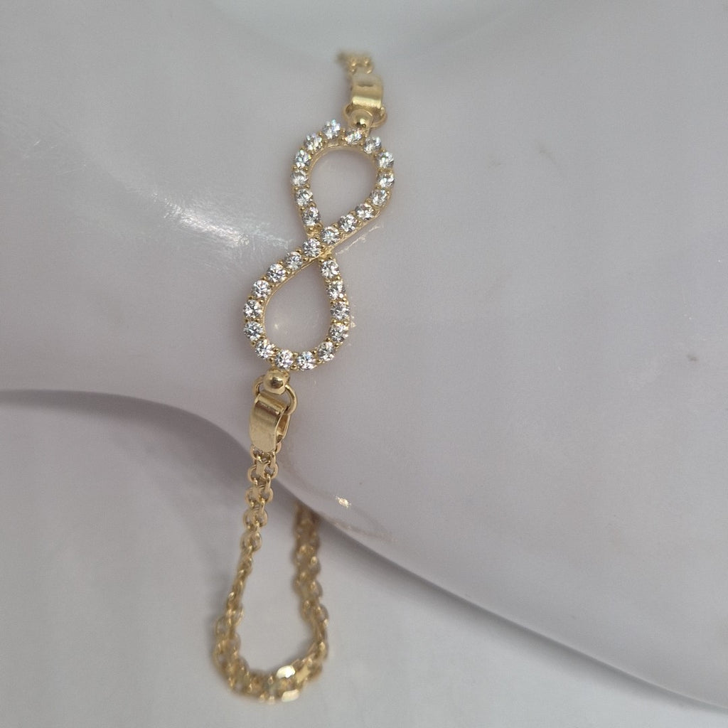 PULSERA TEJIDO ESPECIAL CON INFINITO Y CIRCONIAS 14K 18 CM 3.4 GR (NUEVO)
