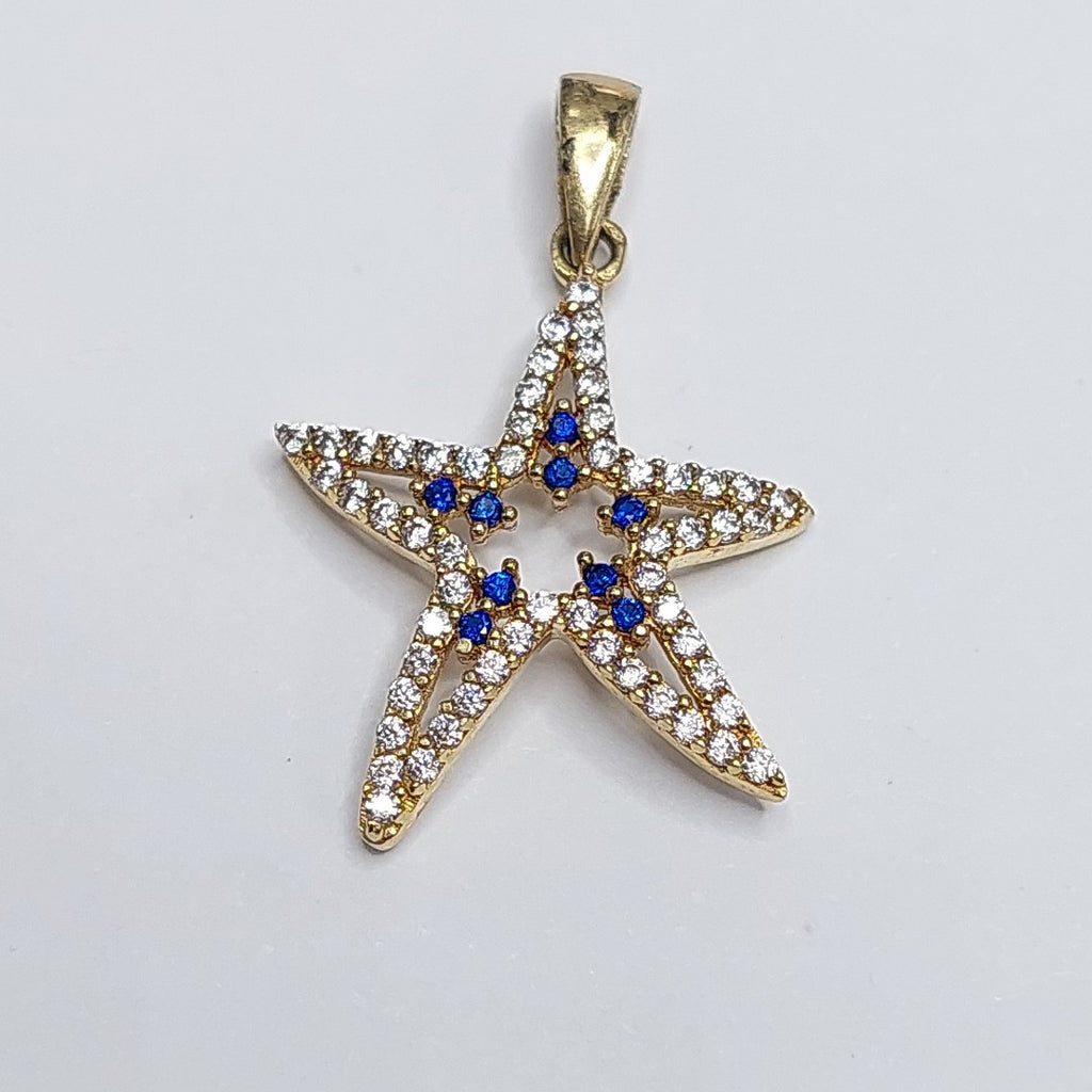 10297DIJ00000B363 FRD5 DIJE ESTRELLA DE MAR CON CIRCONIAS BLANCAS Y AZULES ORO 14K 1.5GRS (NUEVO)