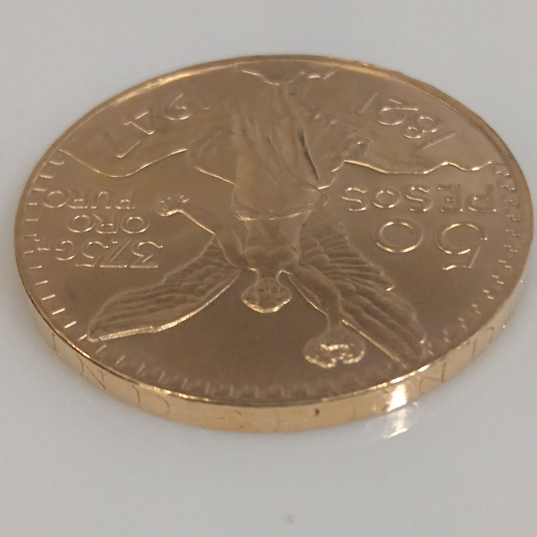 K1 41.6 GRMS - DESC. 0 GRAMOS - 21 K - AVALÚO 77126.4 * * IDENTIFICACIÓN MONEDA NOMINATIVA. * MONEDAS PESOS 50 PESO (SEMINUEVO)