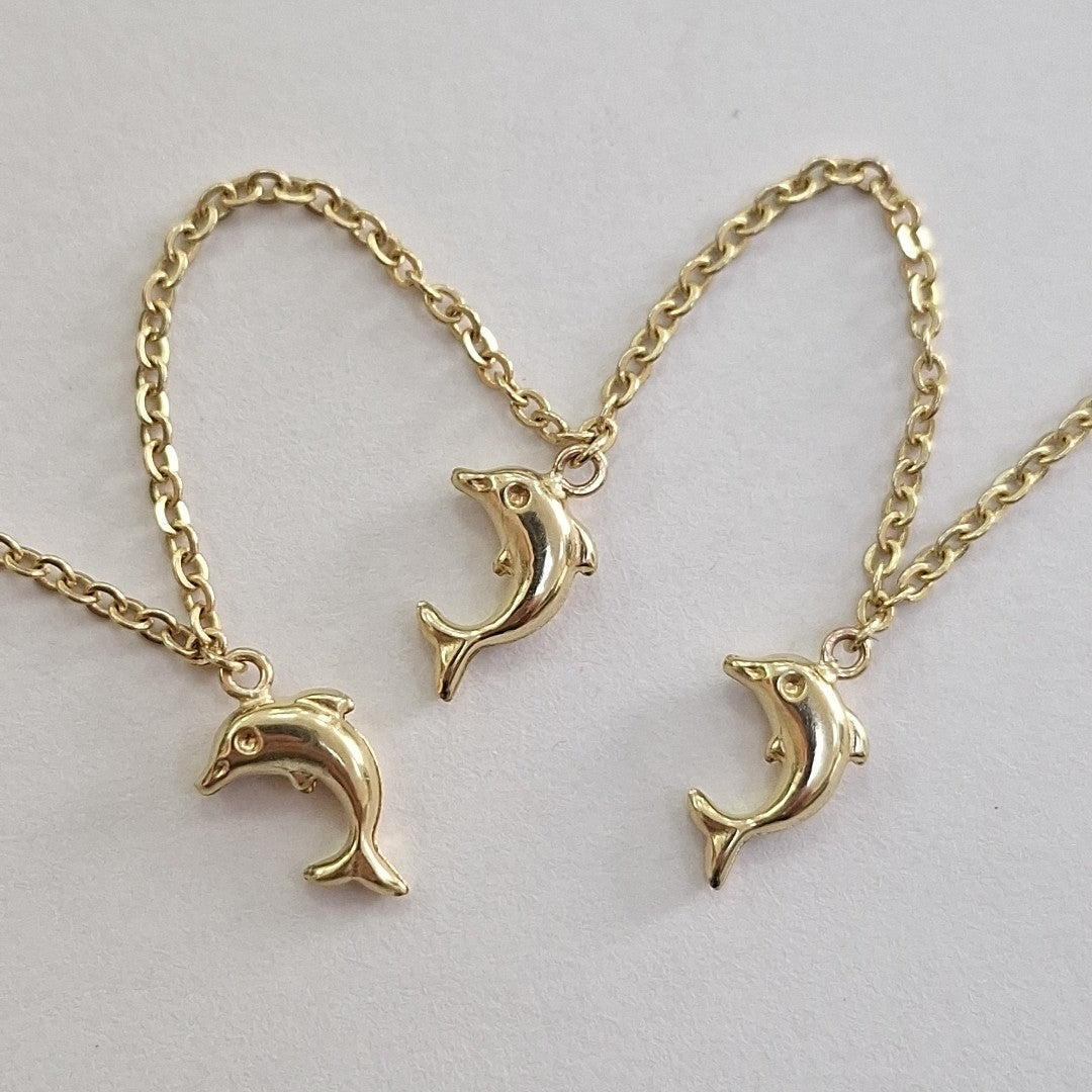 PULSERA ESPECIAL CON DIJES DELFINES 10K 18 CM 2 GR (NUEVO)