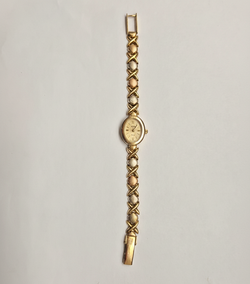 RELOJ CAJA Y PULSO ORO. ORO. 14 K 19.1 GRMS (SEMINUEVO)